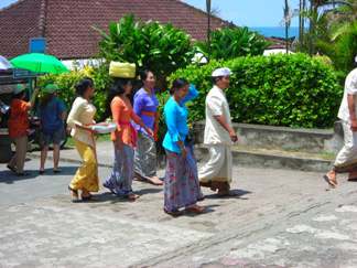 Balinese people are going visit to Tanah Lot